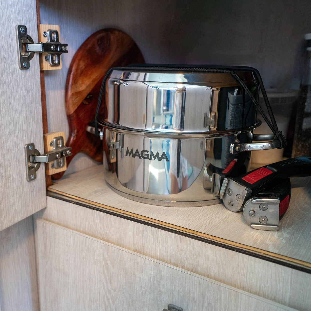 Magma A10-363-2-IND cookware set nested in a galley cabinet